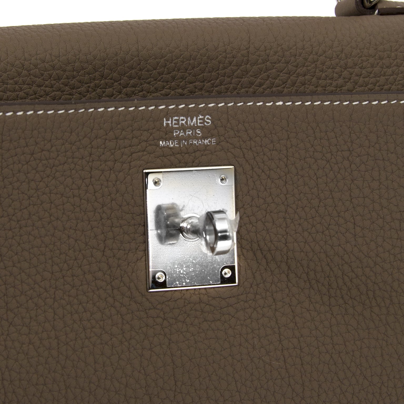 100% authentic Hermès Kelly 32 Togo Etoupe PHW right now at labellov.com without a waitinglist