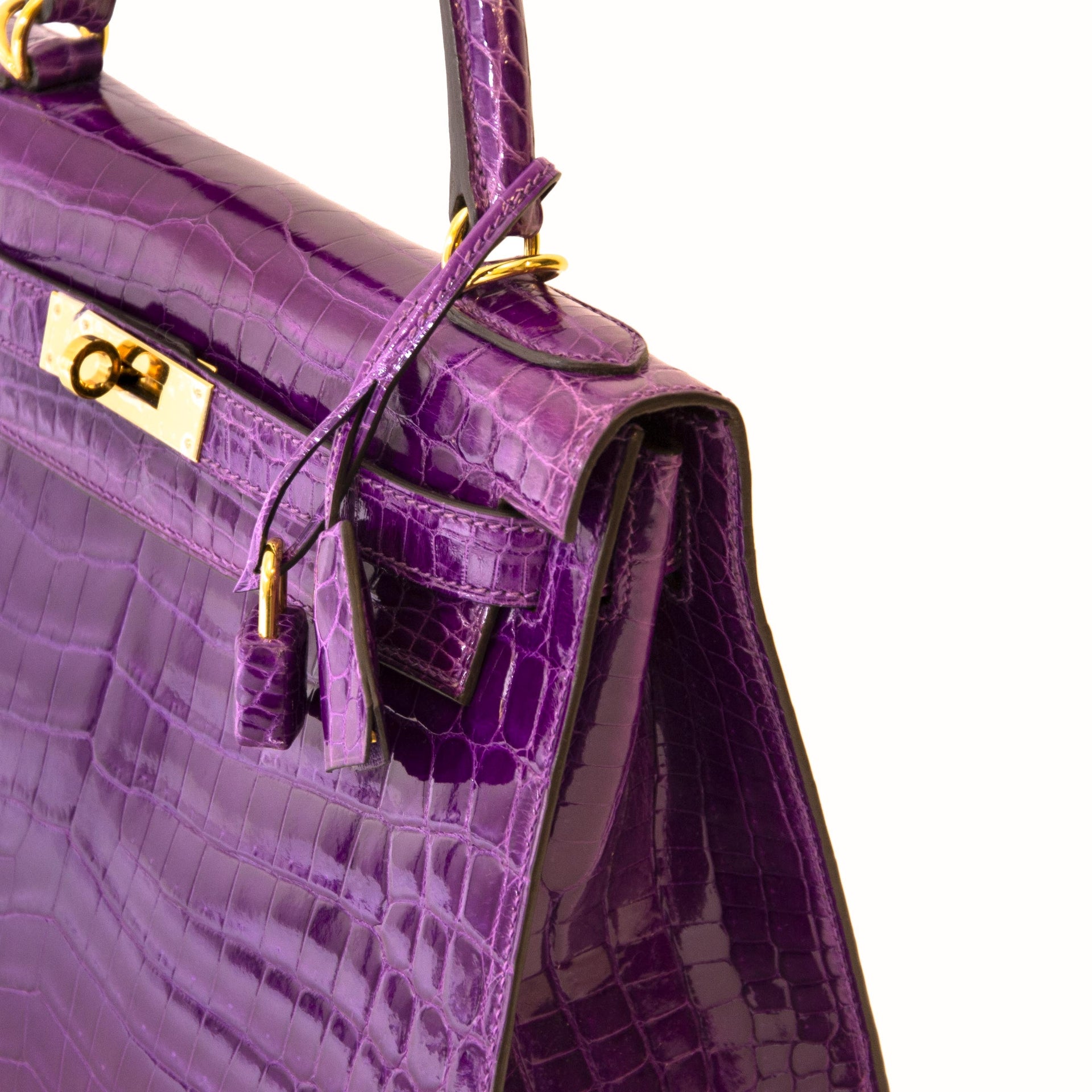 Hermès Kelly 28 Violet Niloticus Crocodile GHW kopen en verkopen online at Labellov