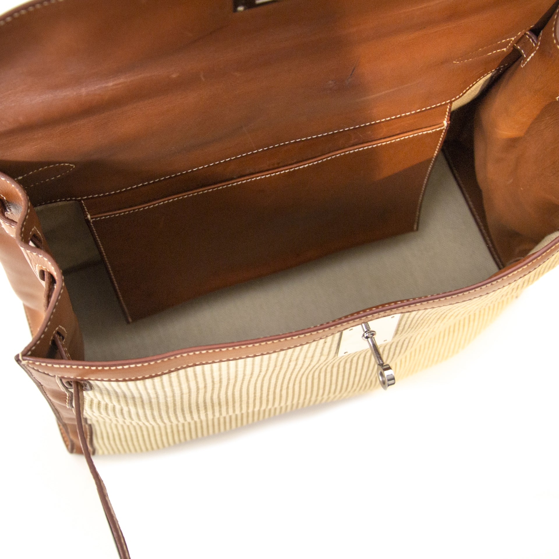 Achetez secur en ligne votre sac Hermès Kelly 35 Barenia Striped Crinoline PHW pour le meilleur prix chez Labellov