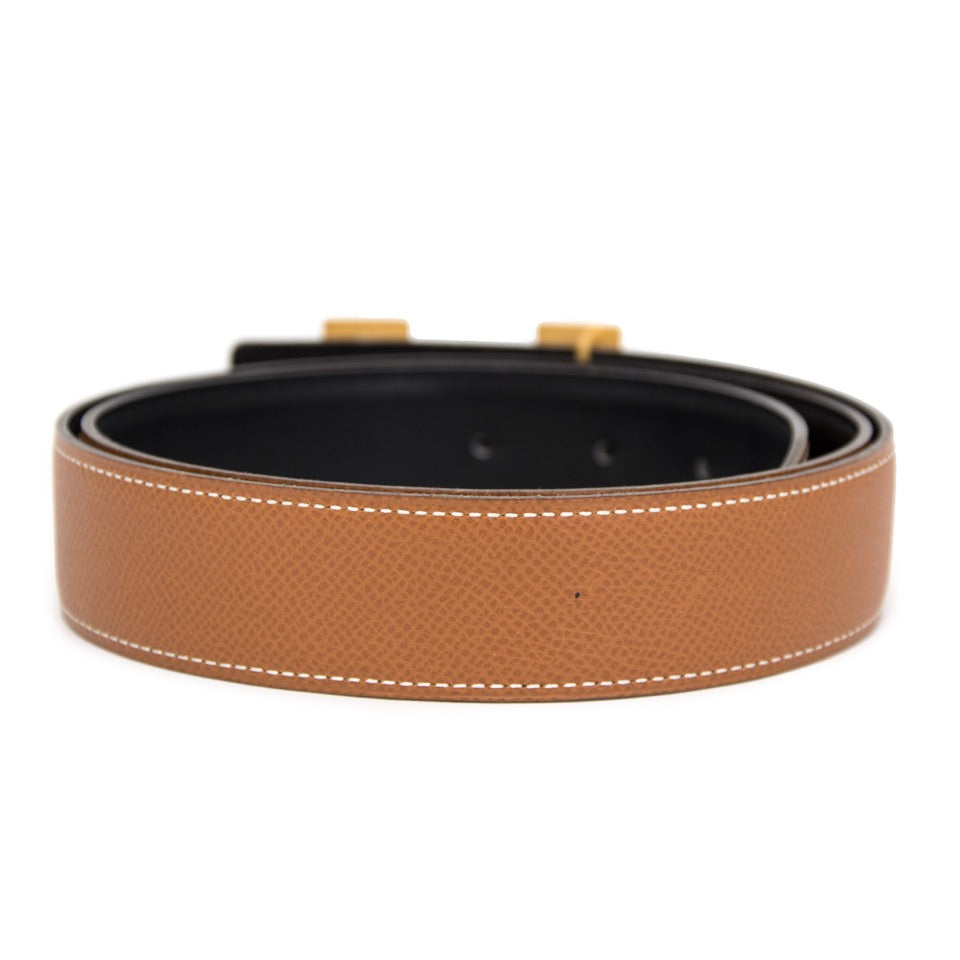 Authentieke Hermes Cognac Black omkeerbare riem voor juiste prijs bij LabelLOV vintage webshop. Hermès Cognac black reversible belt. Veilig online winkelen. Luxe, vintage, mode. Antwerpen, België.