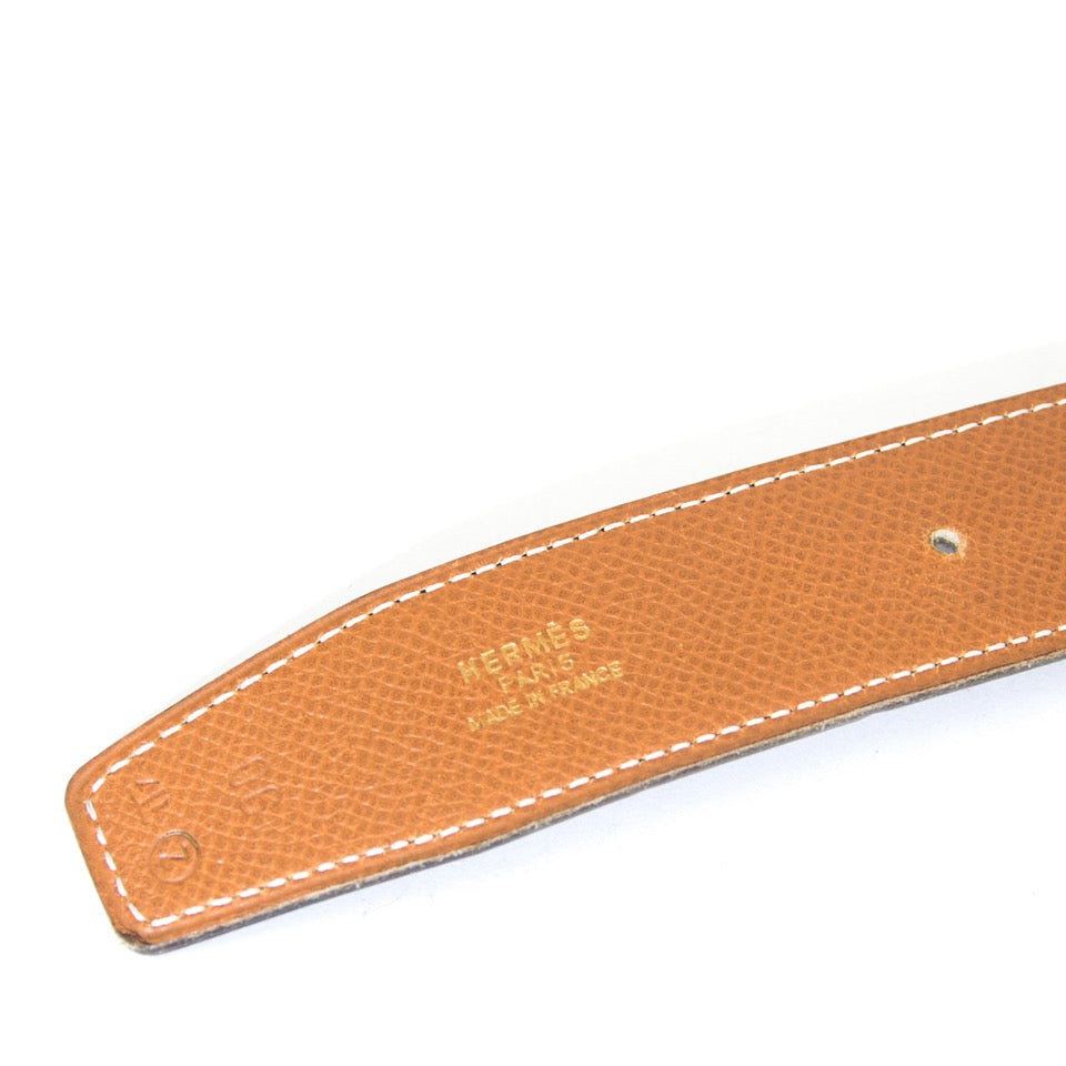 Buy Hermès Cognac black reversible belt. at the right price at LabelLOV vintage webshop. Luxe, vintage, fashion. Safe and secure online shopping. Antwerp, Belgium.