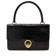 hard to find collectors item vintage searching for a secondhand Hermes Black Sac Ring Croco