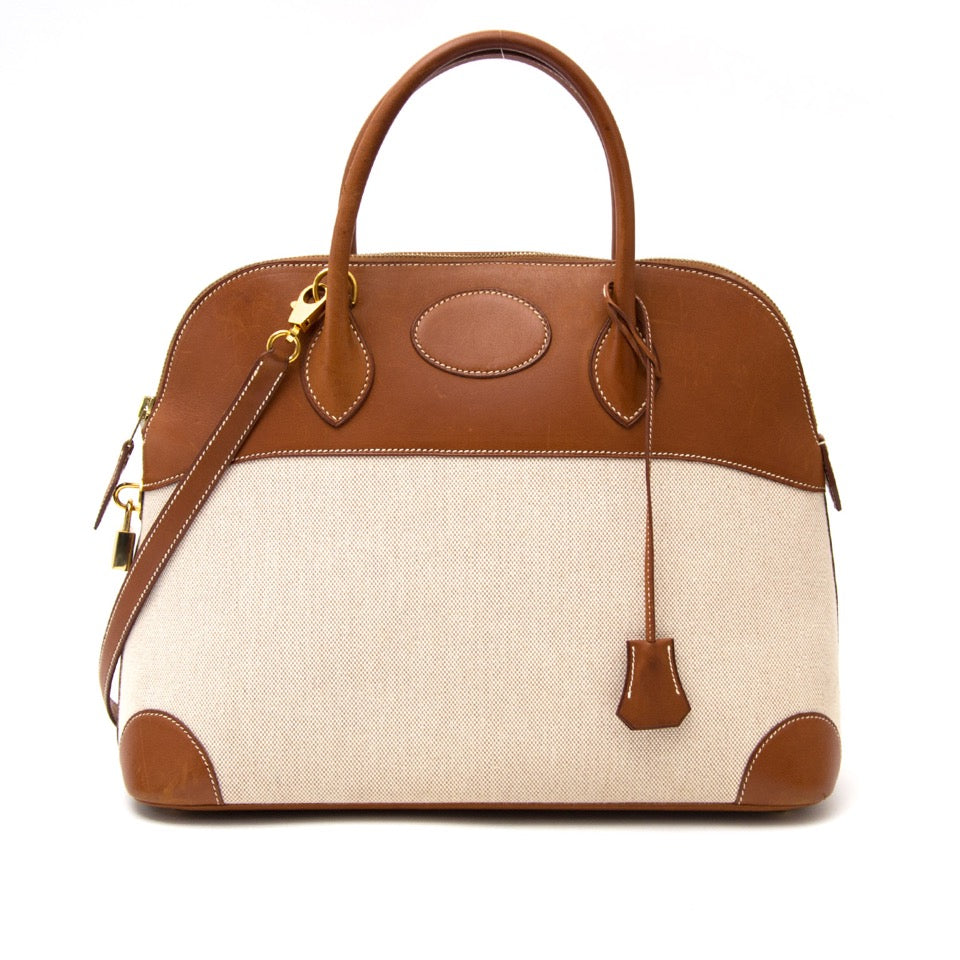 Vintage Hermès Bolide Canvas bag for the best price at Labellov webshop. Safe and secure online shopping with 100% authenticity. Vintage Hermès Bolide Canvas bag pour le meilleur prix.