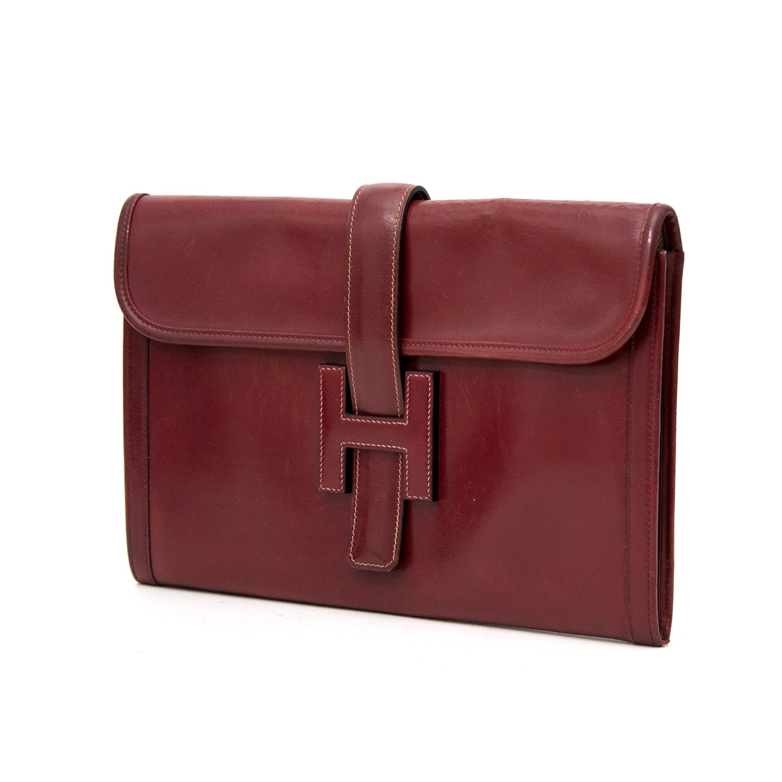 Hermes Bordeaux Jige clutch for the best price available online at Labellov