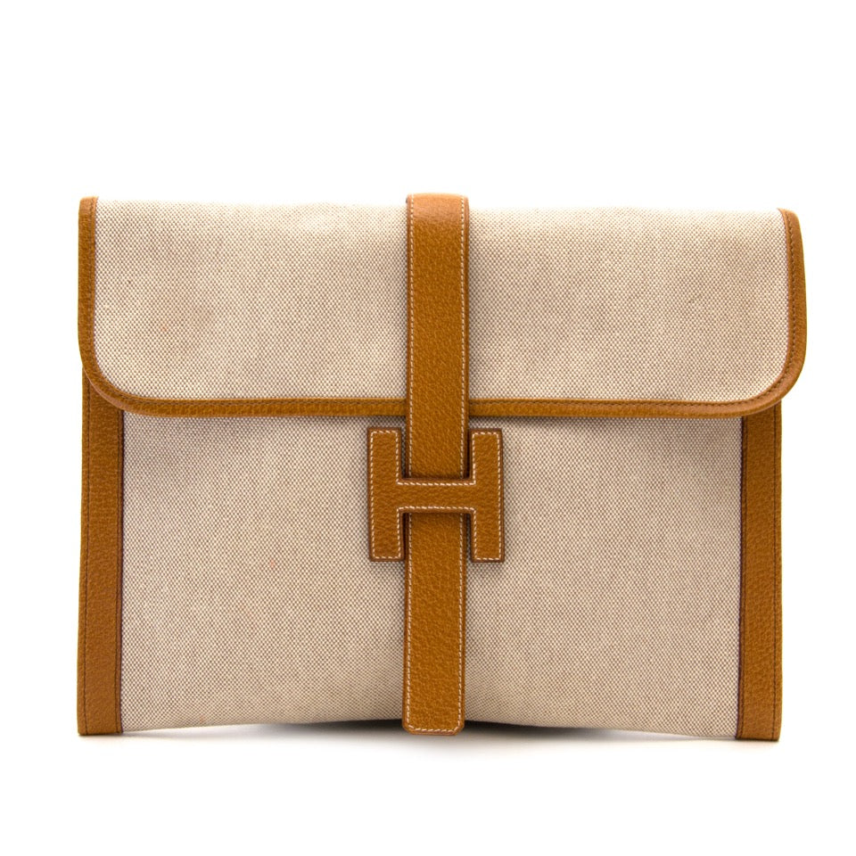Looking for a Hermes canvas envelope jige clutch? Buy your designer bag online with Labellov Timeless Designer Luxury