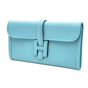 Hermes Jige Elan Saint-Cyr Blue clutch now online at labellov.com. Buy and sell your designer handbags for the best price