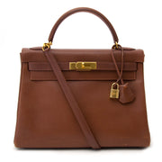 koop online Hermes Kelly 32 Marron Veau Ardennes aan de beste prijs wereldwijd shippen