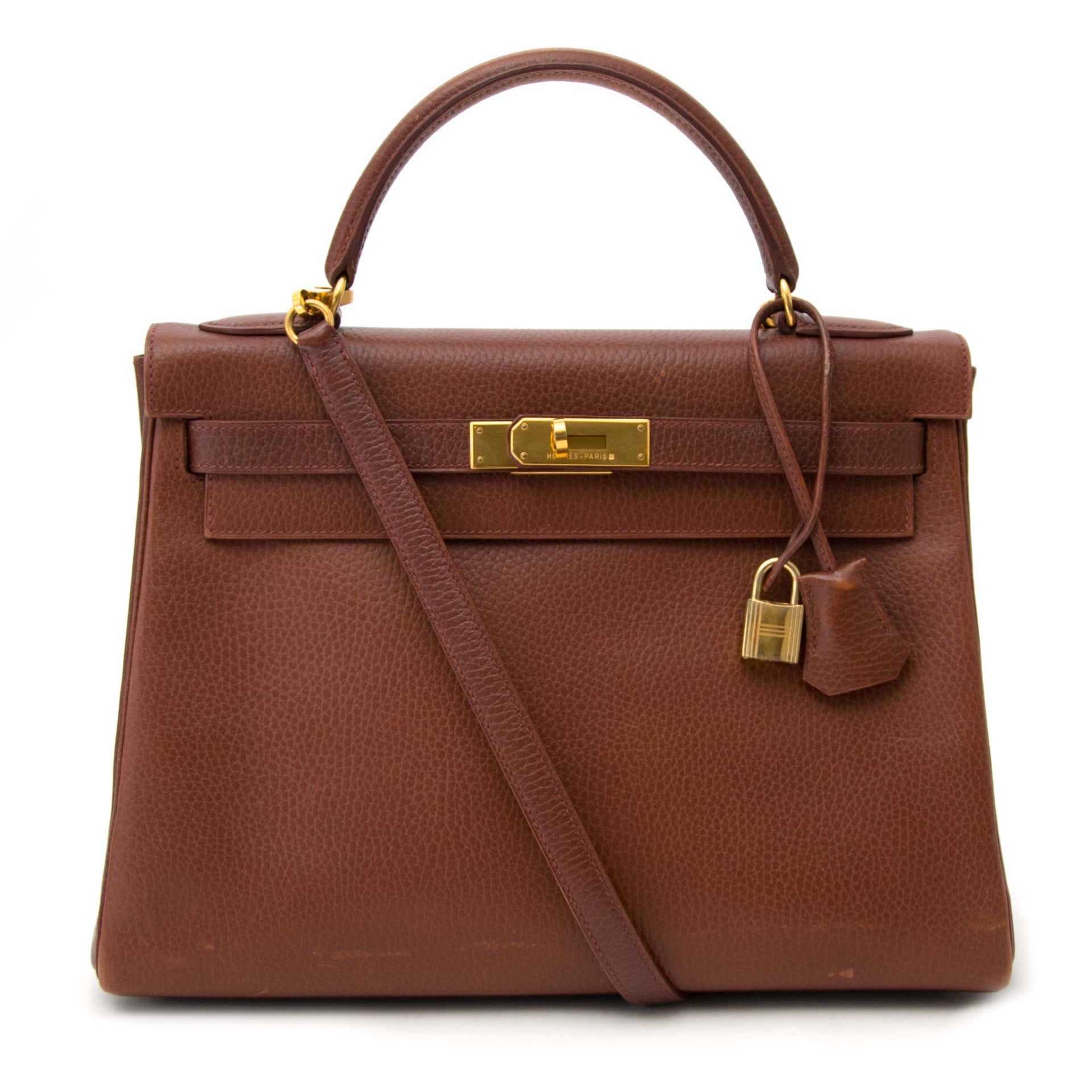 koop online Hermes Kelly 32 Marron Veau Ardennes aan de beste prijs wereldwijd shippen