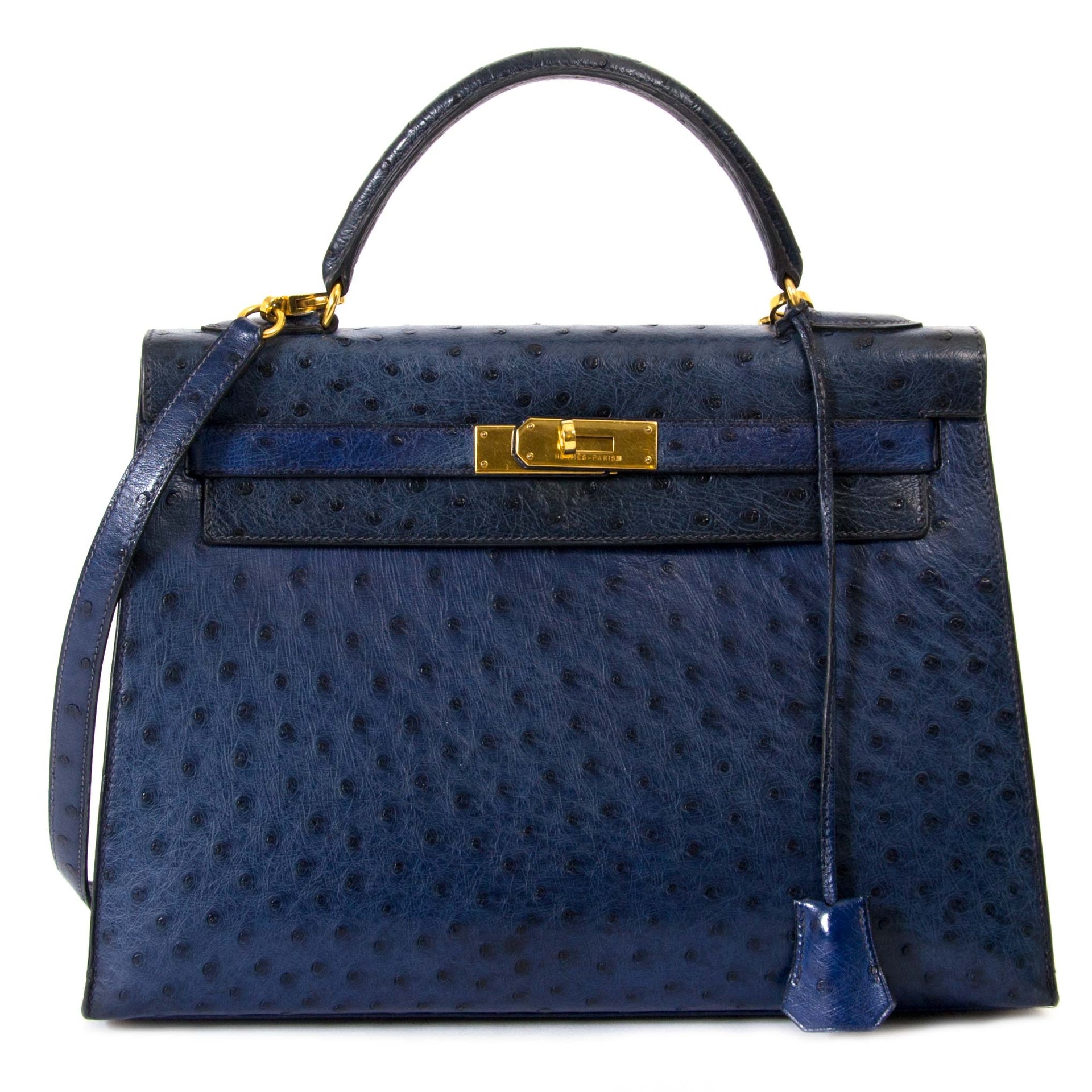 Buy 100% authentic Hermès Kelly 32 Ostrich Blue GHW for the best price at Labellov secondhand luxury in Antwerp
