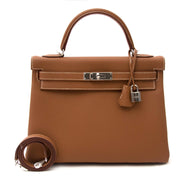 Hermès kelly 32 togo gold phw now online at labellov.com 100% authentic