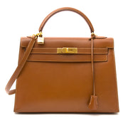 Acheter en ligne chez labellov.com pour le meilleur prix Hermes Kelly Gold Sac a main 32cm