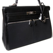 Hermès Kelly 35cm Lakis Black Boxcalf Leather with Toile PHW kopen en verkopen aan de beste prijs