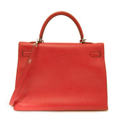Buy vintage Hermes Kelly 35 Bougainvillea Red Swift PHW with strap at the right price at LabelLOV vintage webshop. Luxe, vintage, fashion. Safe and secure online shopping. Antwerp, Belgium.