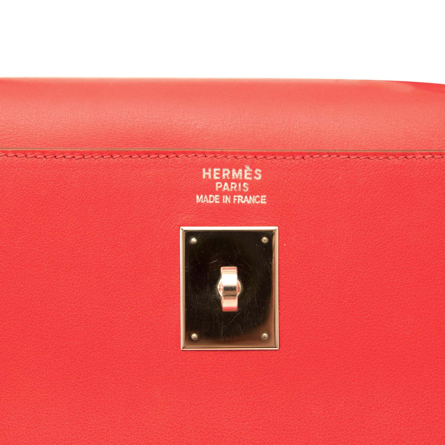 Buy vintage Hermes Kelly 35 Bougainvillea Red Swift PHW with strap at the right price at LabelLOV vintage webshop. Luxe, vintage, fashion. Safe and secure online shopping. Antwerp, Belgium.