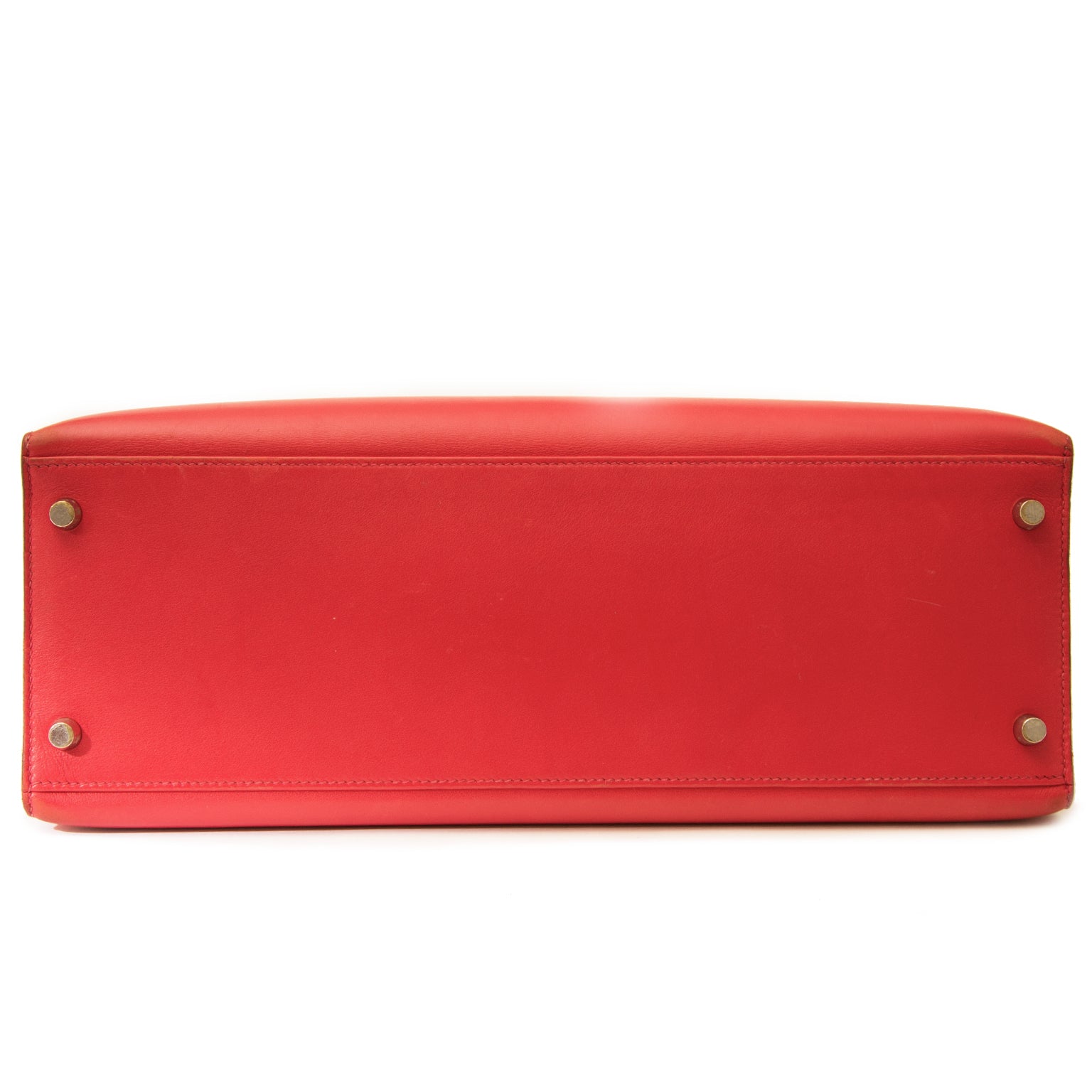 Buy vintage Hermes Kelly 35 Bougainvillea Red Swift PHW with strap at the right price at LabelLOV vintage webshop. Luxe, vintage, fashion. Safe and secure online shopping. Antwerp, Belgium.