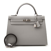 Hermès Kelly Sellier 32 Epsom Gris Mouette PHW for sale in Belgium Antwerp, www.labellov.com, band new Hermès Kelly Sellier 32 Epsom Gris Mouette PHW bags, 100% authentic and a real musthave.