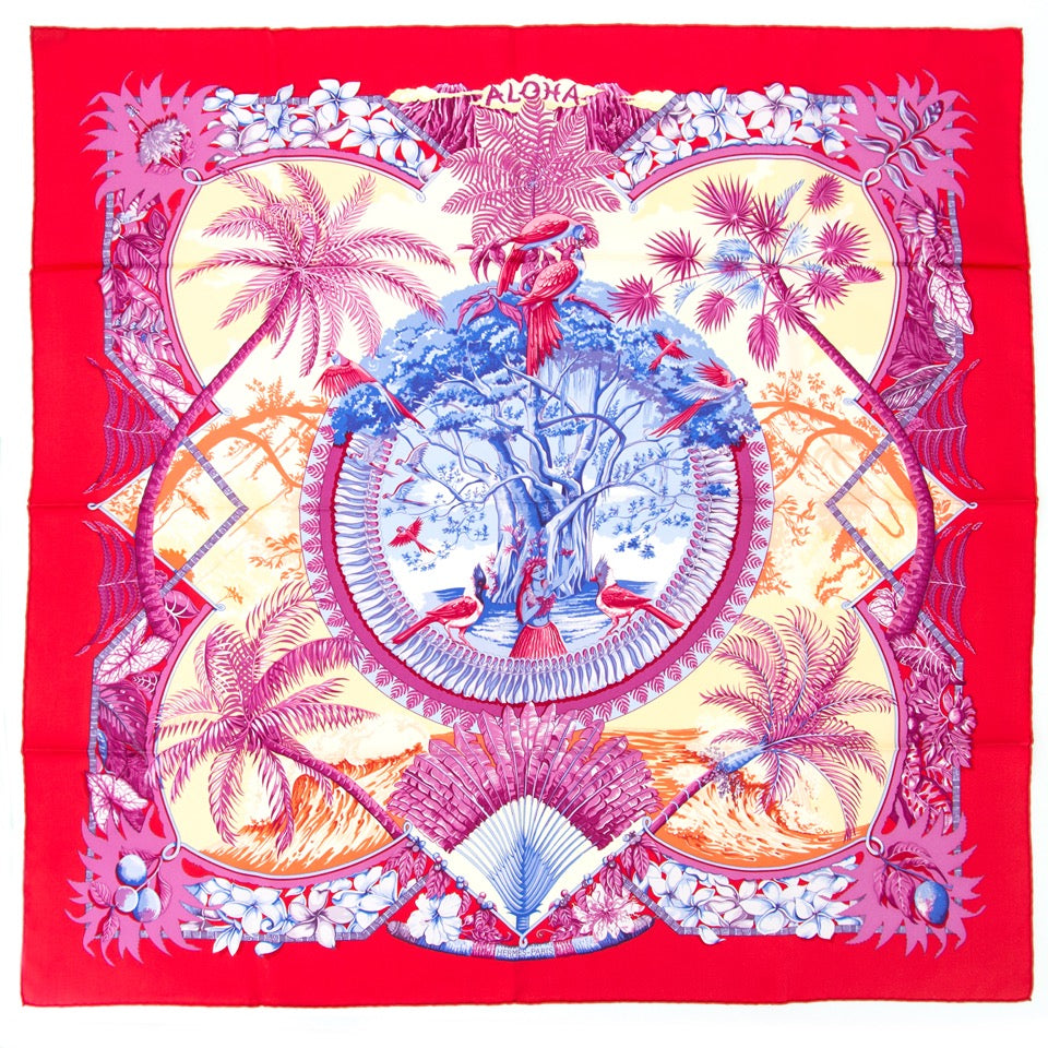 Authentieke Hermes sjaal ALoha in rood 100% zijde voor de juiste prijs bij LabelLOV vintage webshop. Hermes scarf carré de soie aloha red tones 100% silk. Veilig online winkelen. Luxe, vintage, mode. Antwerpen, België.