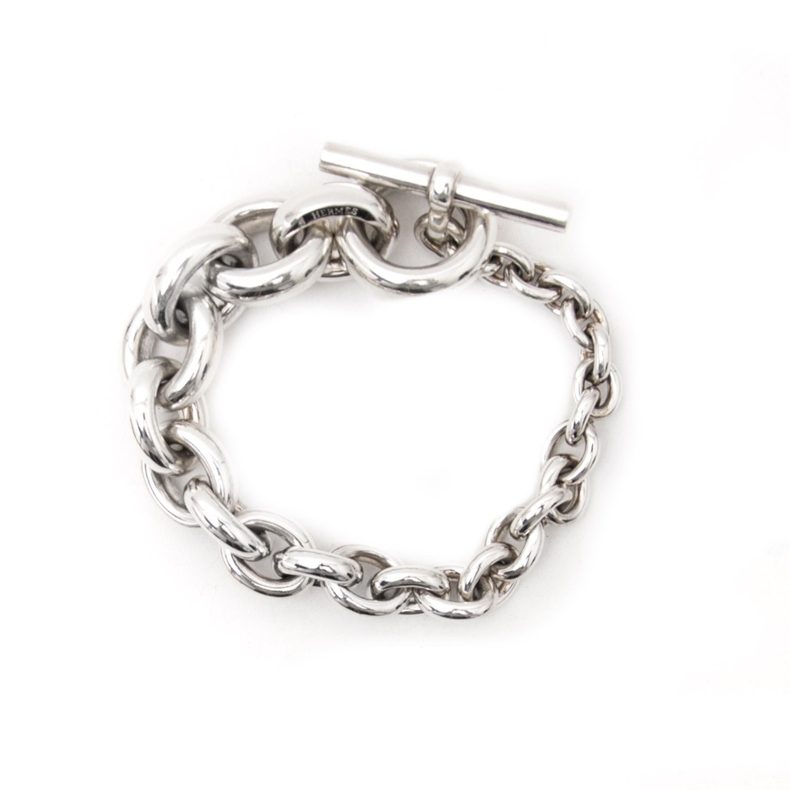 Hermès silver link toggle bracelet now online at labellov.com for the best price.
