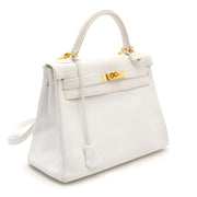 skip the waitinglist shop safe online authentic shop your designer luxury Hermès White Kelly 32cm Clemence Taurillon GHW at the best price online