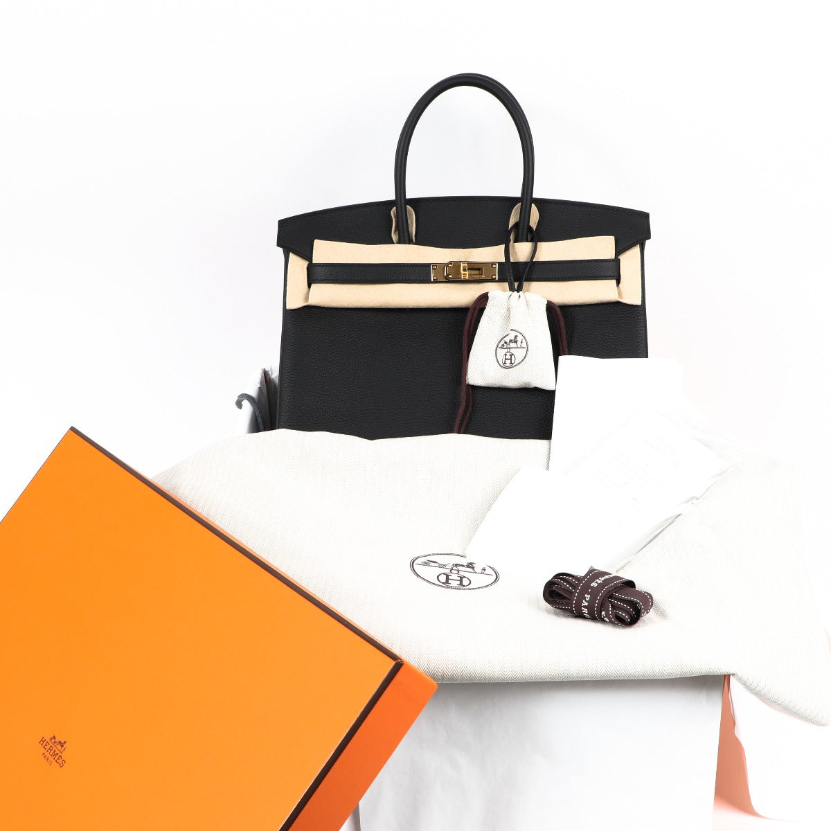 Buy authentic second hand luxury designer Hermes Birkin bag black togo on Labellov.com