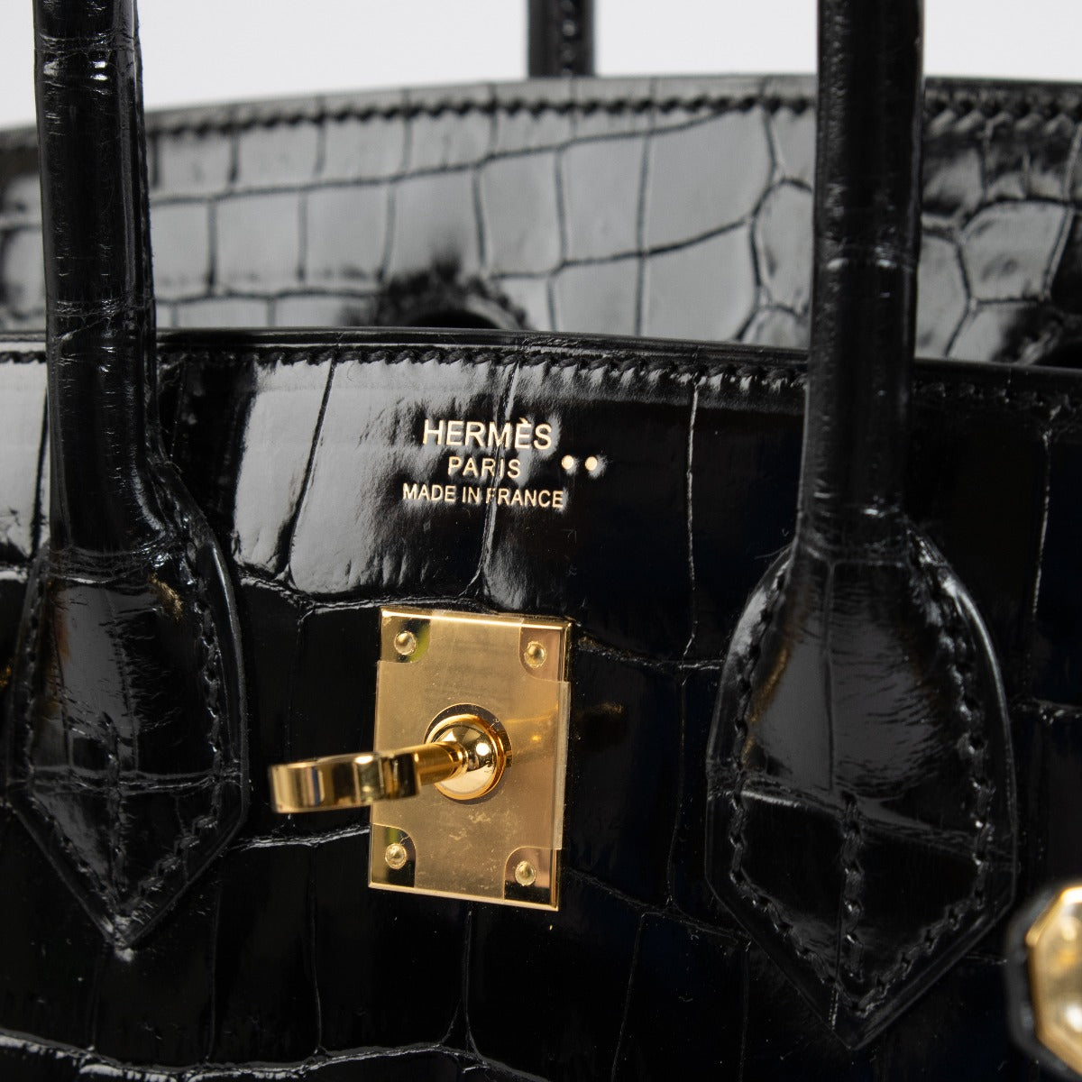 Hermès Birkin 25 Zwart Glanzend Krokodil Niloticus GHW