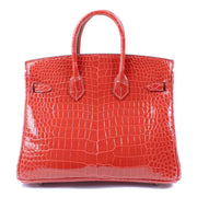 Authentic second hand brand new 2024 Hermès Birkin 25 Braise Shiny Crocodile Porosus Lisse PHW on www.labellov.com