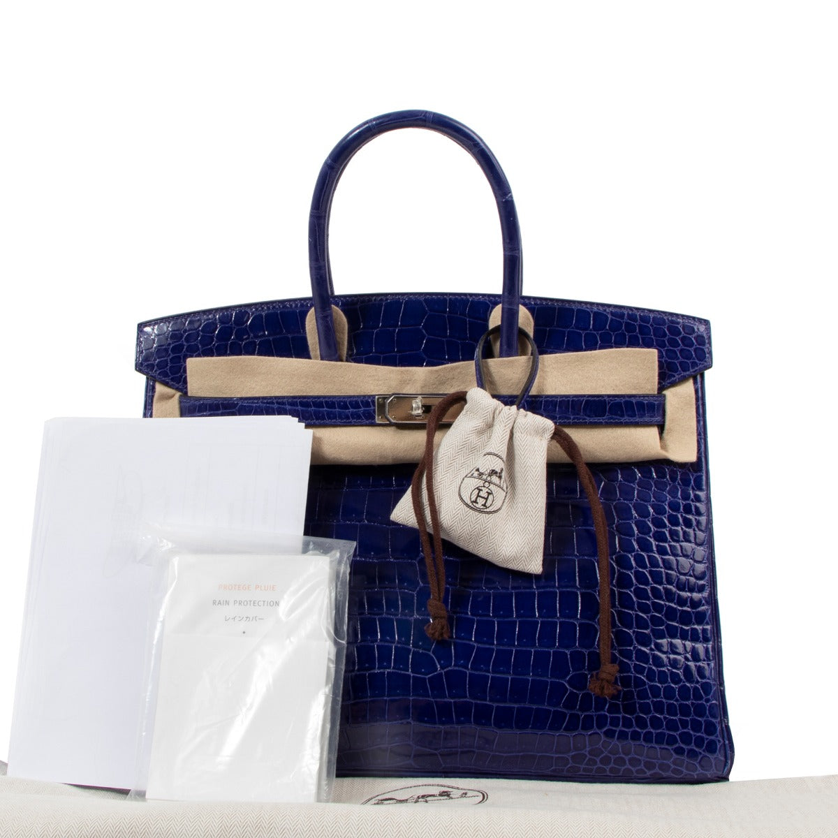 Authentic second hand luxury designer Hermès Birkin 35 Bleu Electrique Shiny Crocodile Porosus Lisse Palladium Hardware on labellov.com
