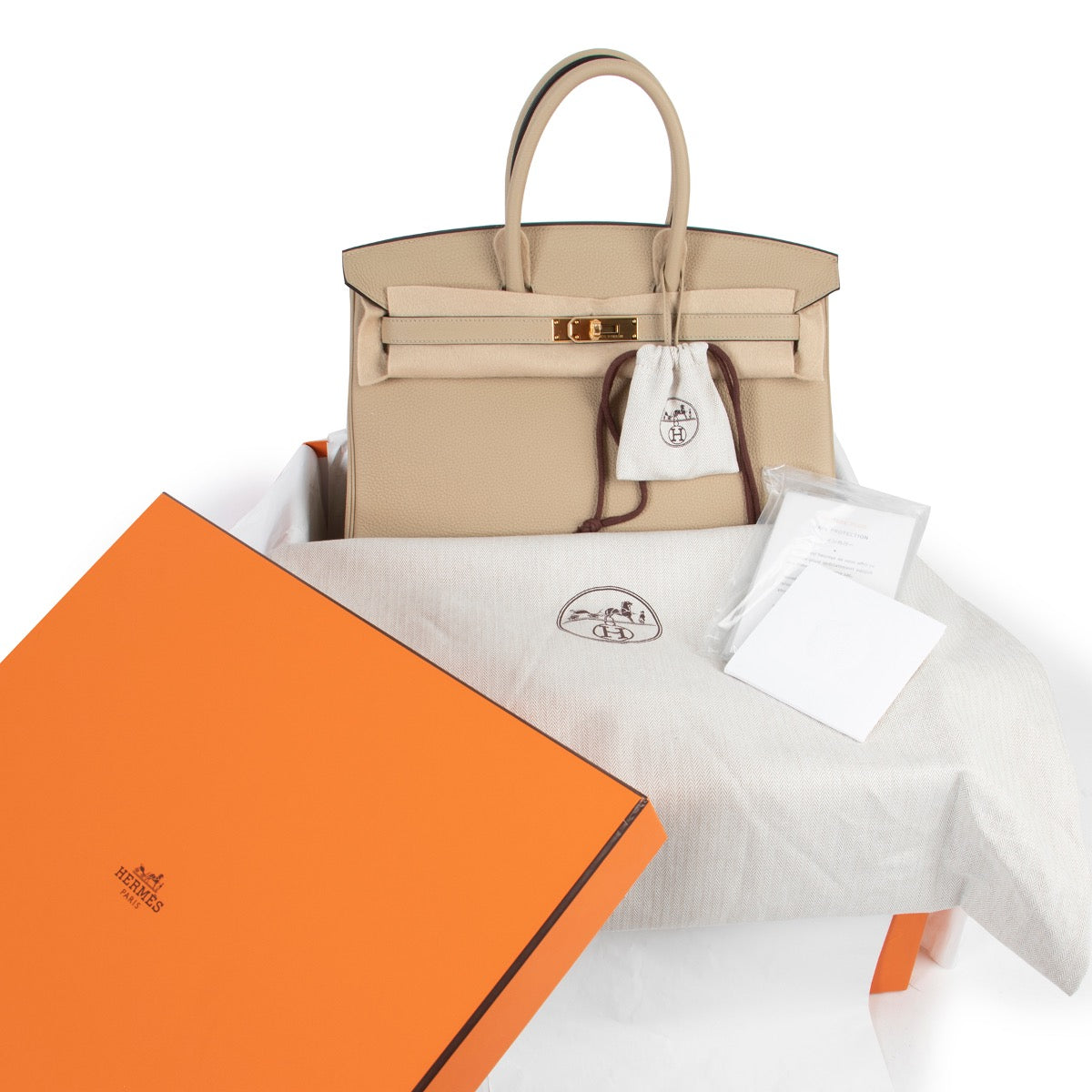 Shop safe online at Labellov in Antwerp this 100% authentic Hermès Birkin 35 Trench Togo GHW in brand new condition at the right price.