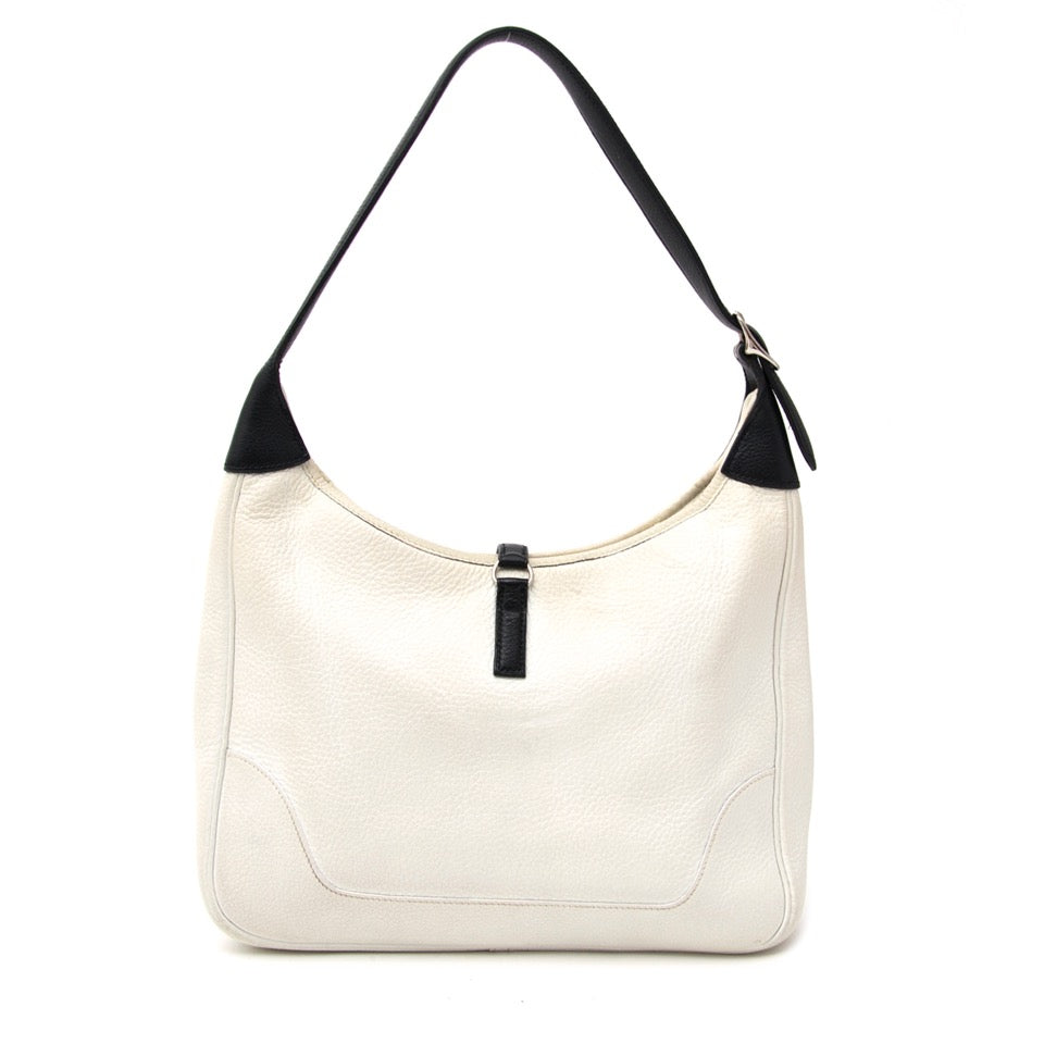 Buy Brand New Hermes white plume bag with black trim at the right price at LabelLOV vintage webshop. Luxe, vintage, fashion. Safe and secure online shopping. Antwerp, Belgium.
