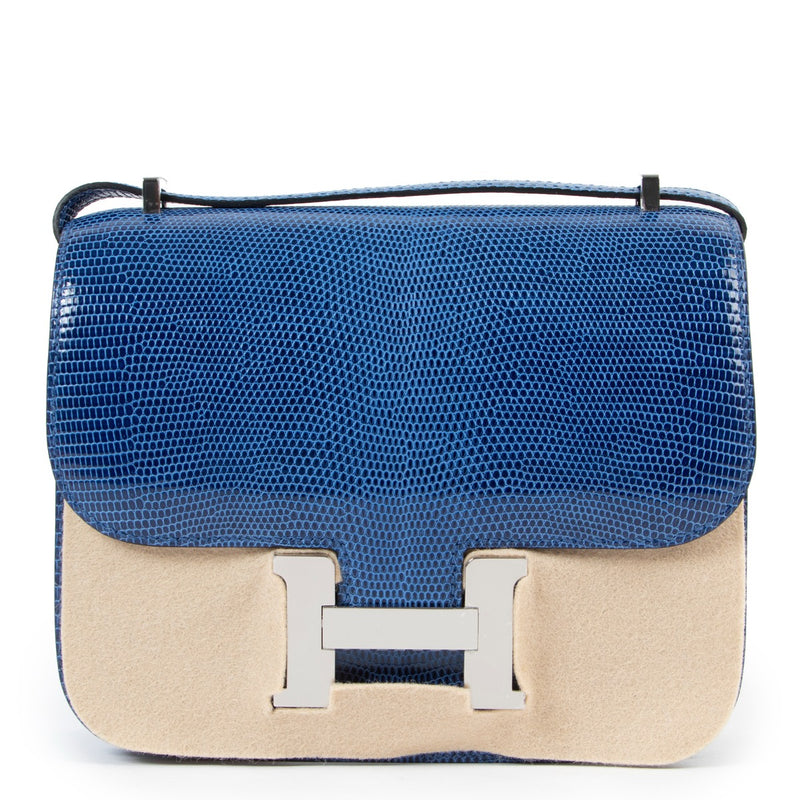 Buy authentic second hand luxury designer Hermès Constance Mini Bleu Saphir Lizard Niloticus Lisse PHW at Labellov.