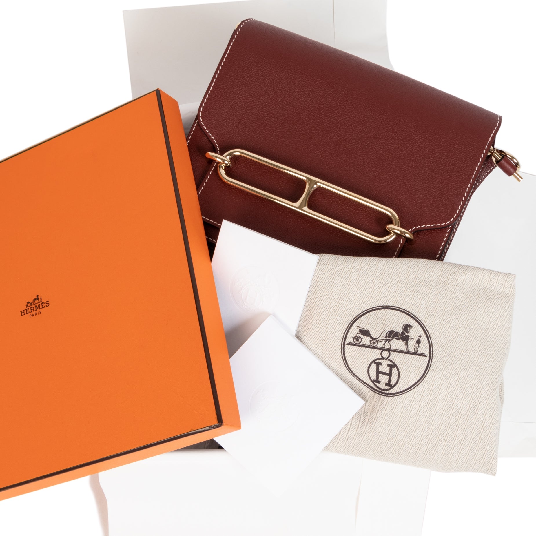 Are you looking for an authentic designer Hermès Roulis veau Evercolor Rouge H ?