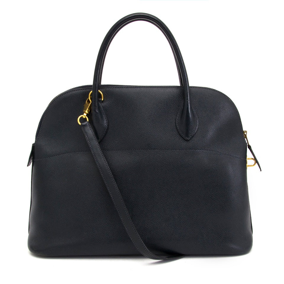 Authentieke Hermes Bolide Dark Blue GHW 35 voor de juiste prijs bij LabelLOV vintage webshop. Hermes Bolide Dark Blue GHW 31. Veilig online winkelen. Luxe, vintage, mode. Antwerpen, België.