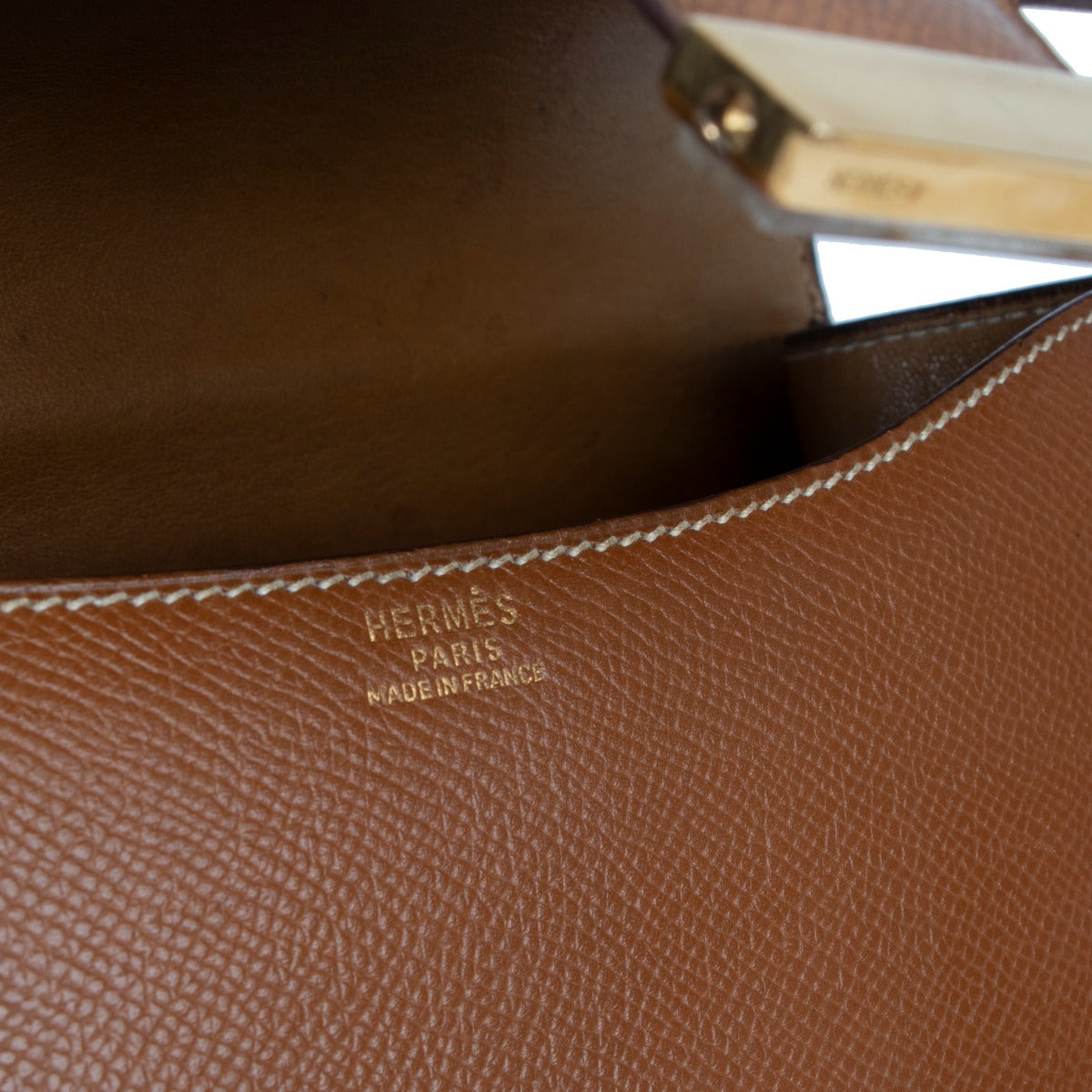 Shop authentic second hand Hermès Vintage Constance 23 Gold Courchevel Gold Hardware at Labellov
