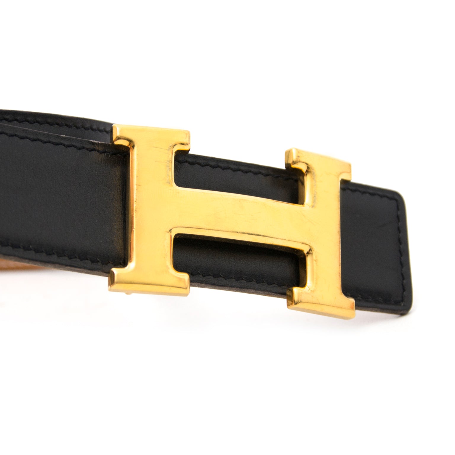 Shop safe and secure online Hermès Reversible Gold/Black Constance H Belt at Labellov.com