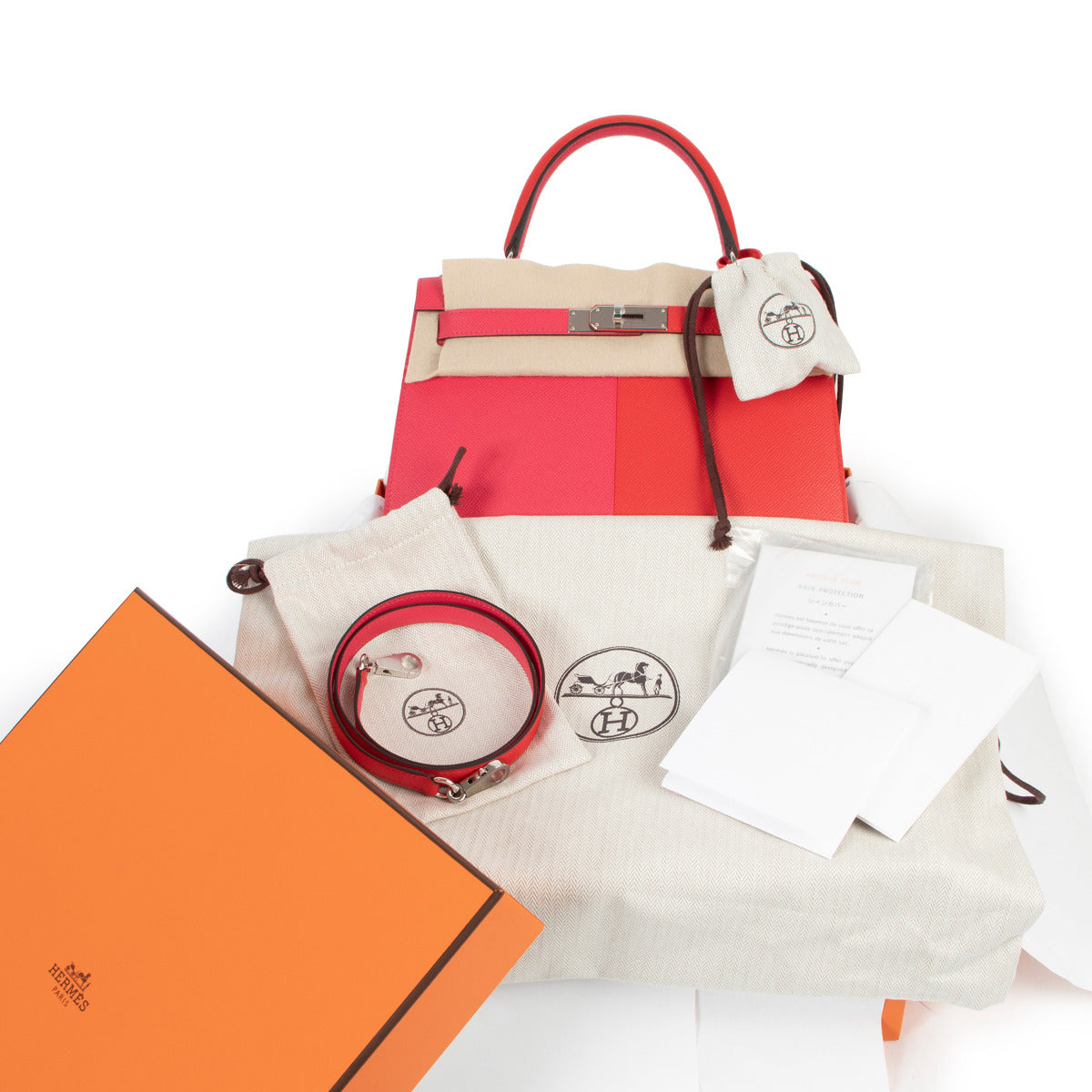 Hermès Kelly 28 Sellier Casaque Tri-Color Rouge Coeur Rose Extreme Bleu Zanzibar Epsom PHW for the best price at Labellov secondhand luxury in Antwerp Belgium