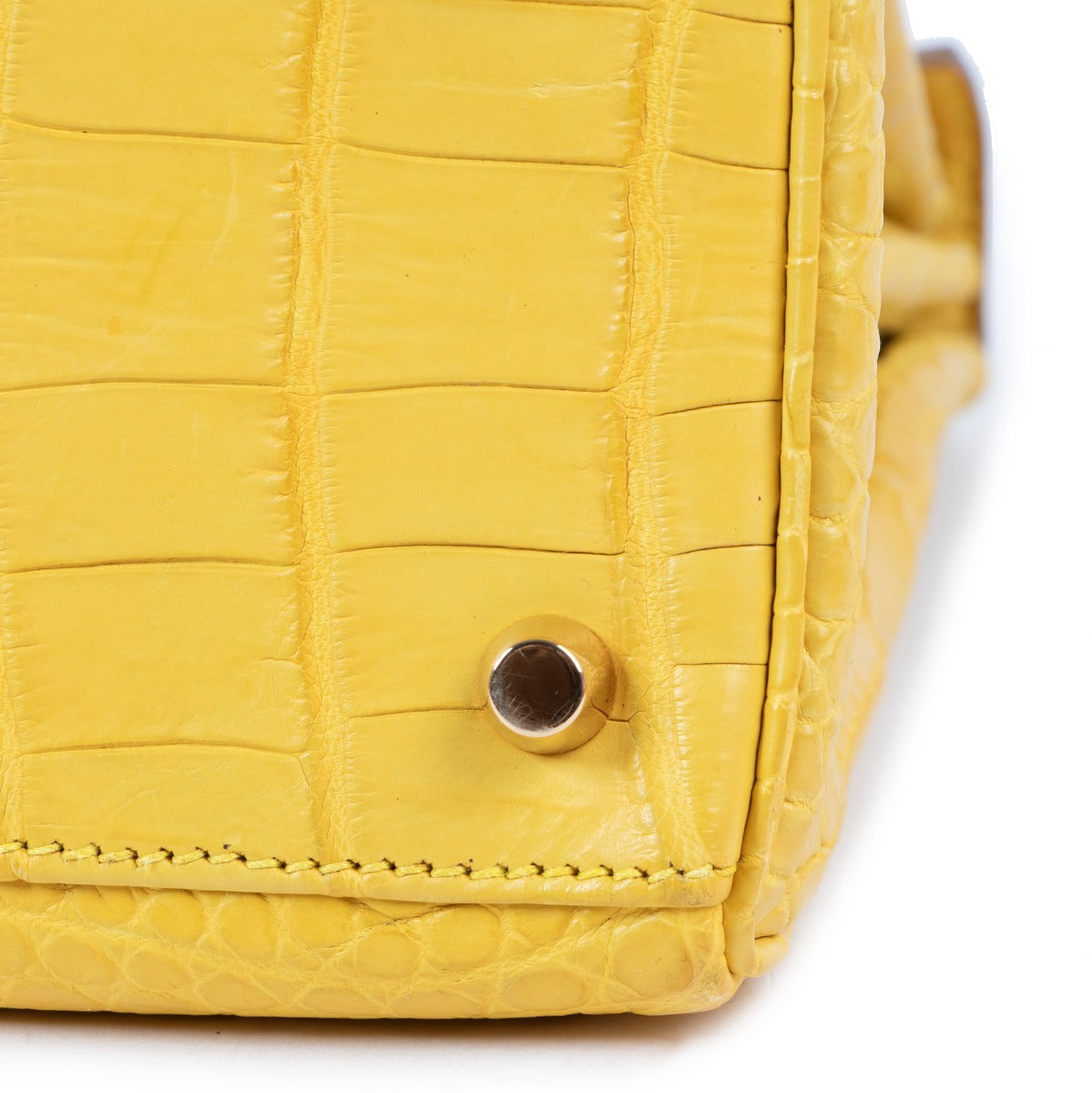 Second hand Hermès Kelly 28 Mimosa Yellow Crocodile Niloticus gold hardware