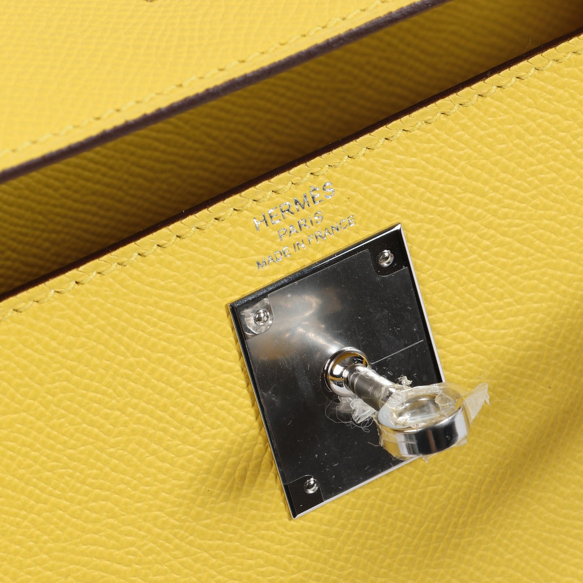 Hermes Kelly Yellow Logo Stamp Detail