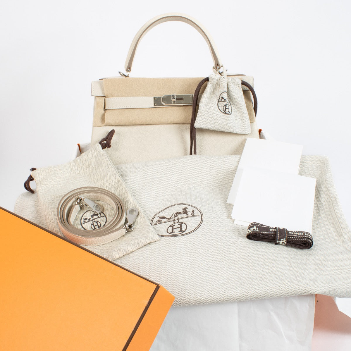 Shop authentic brand new store fresh 2024 Hermès Kelly 28 Craie Togo PHW on www.labellov.com