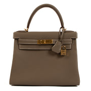 Hermès bas excllusively available at Labellov in Antwerp. Buy your Hermès Kelly 25 Etoupe Togo GHW and skip the waiting list.