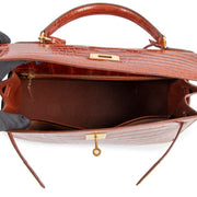 authentic second hand Hermès Kelly 32 Shiny Alligator Lisse Miel Gold Hardware At labellov