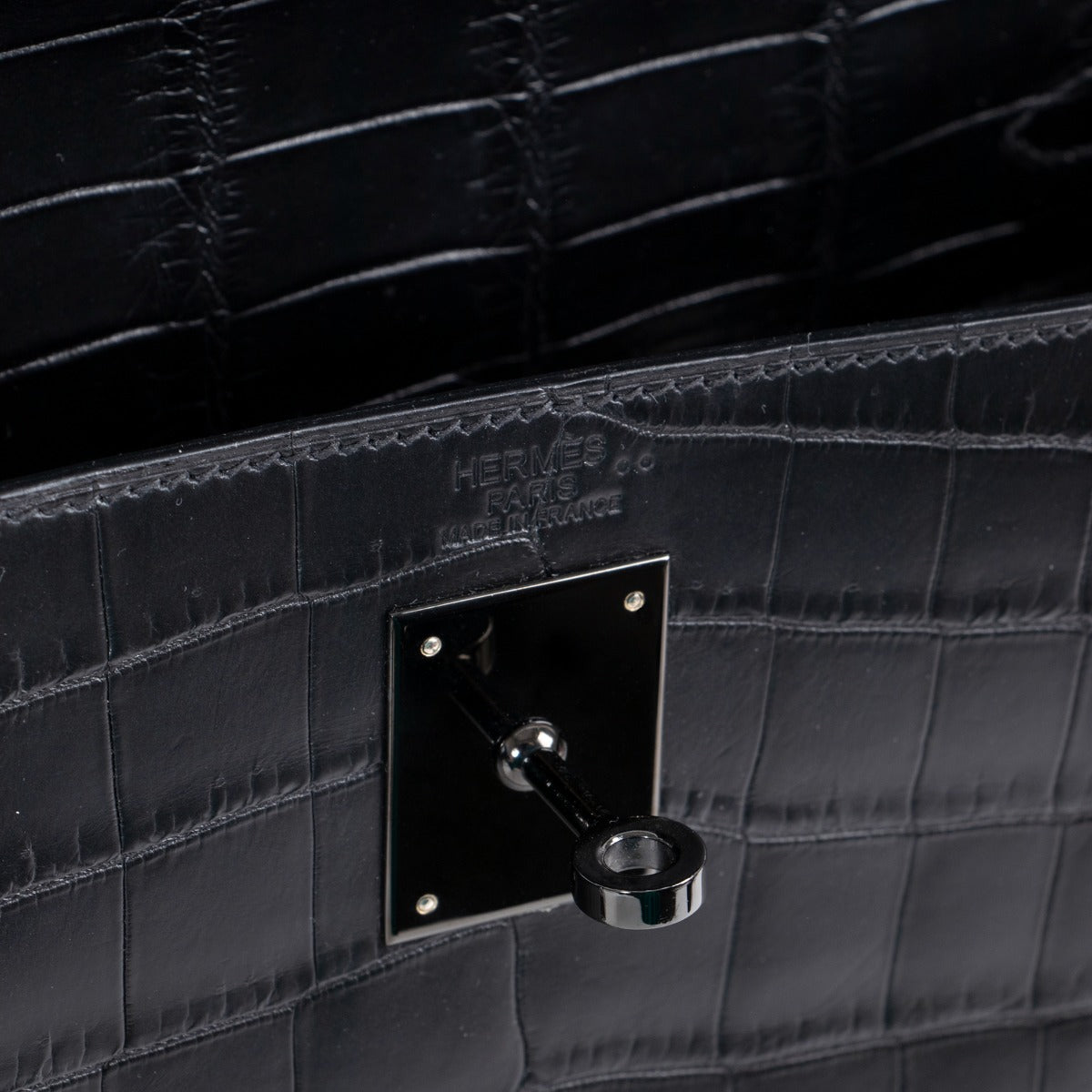 hermes kelly so black logo stamp