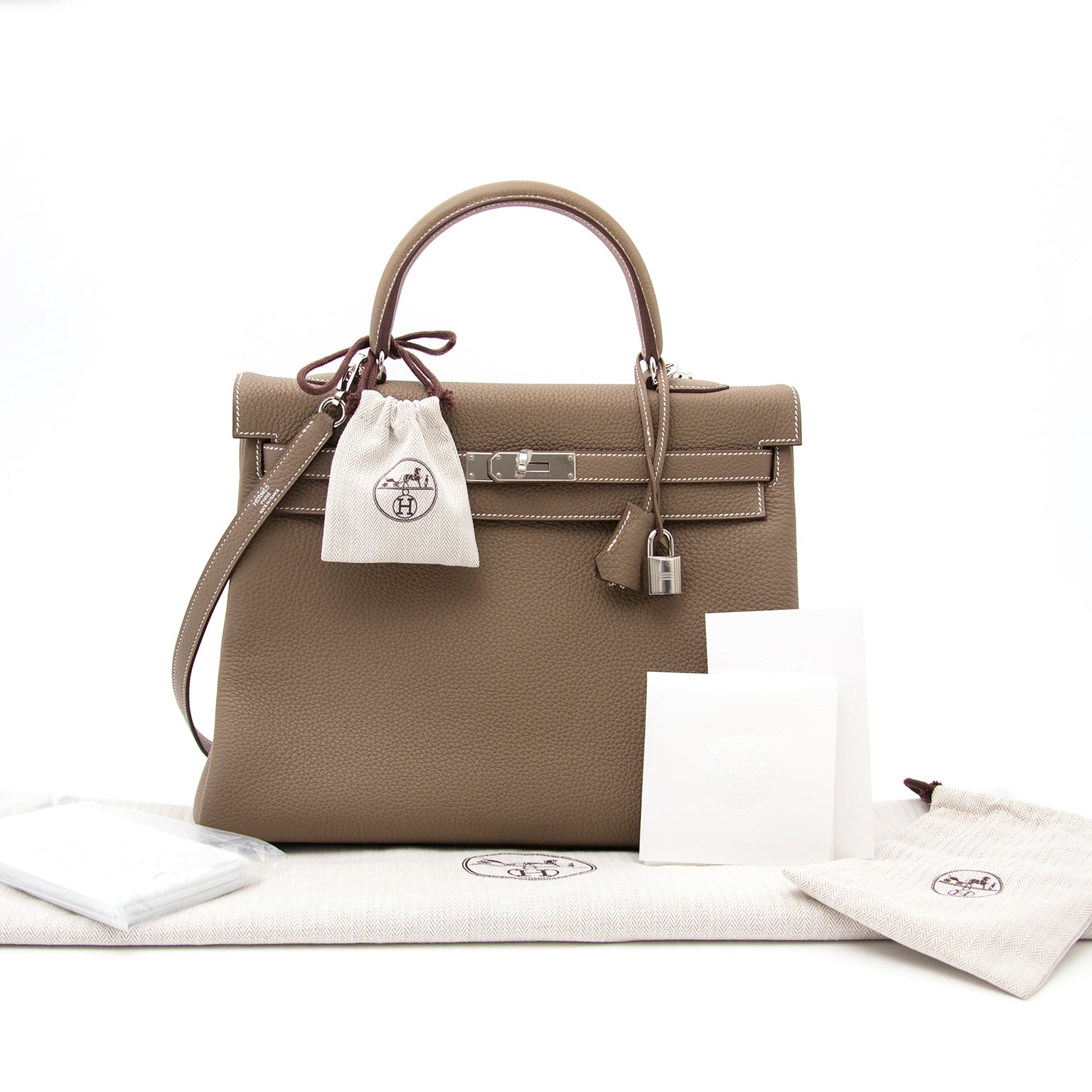 Buy safe and secure at labellov.com Hermès Kelly 35 togo etoupe 100% authentic
