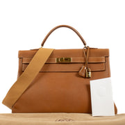 Authentic second hand vintage Hermès Kelly 40 Gold Courchevel GHW on www.labellov.com