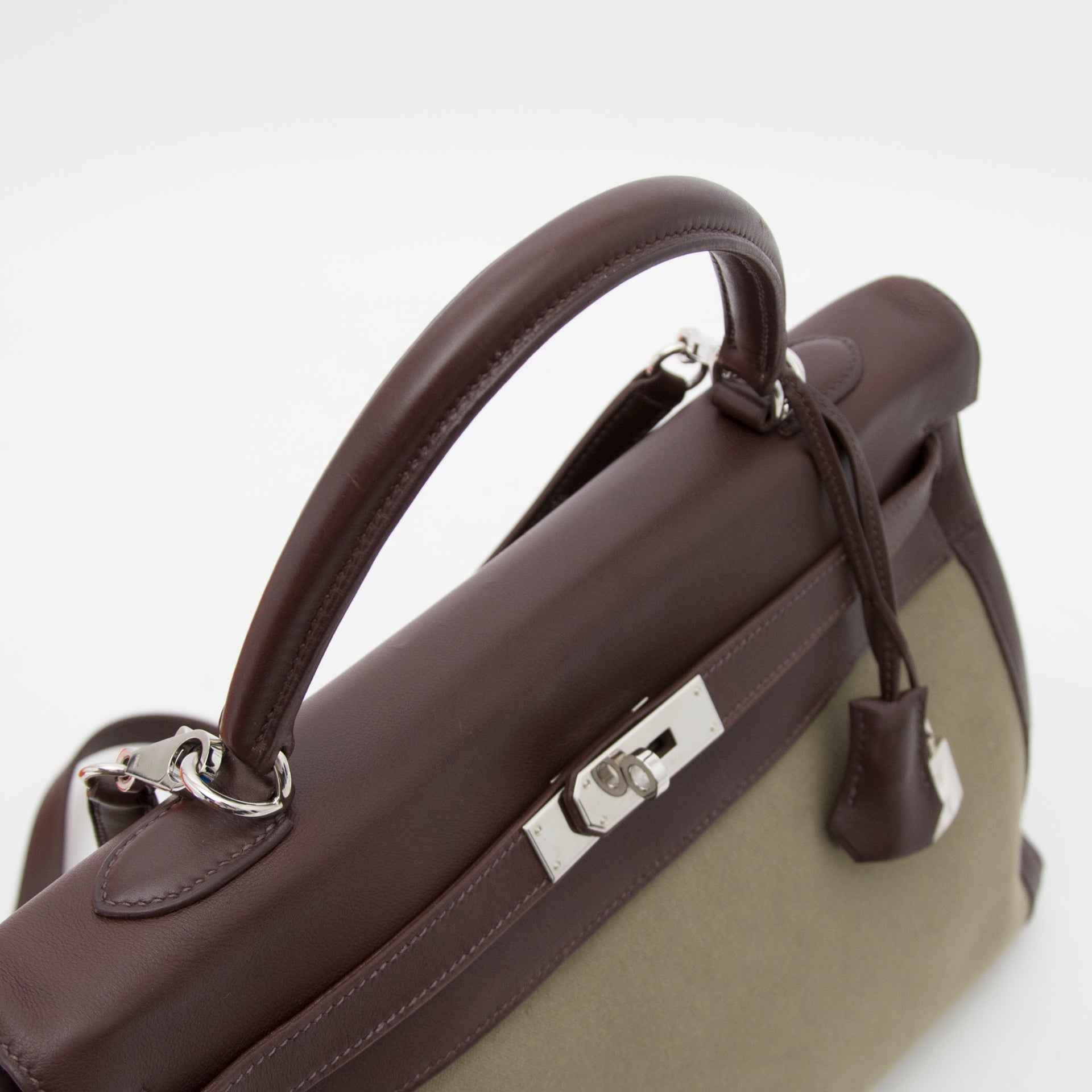 The Hermès Kelly 35 Khaki is now for sale, iconic handbag luxury designer items in Belgium or online.
