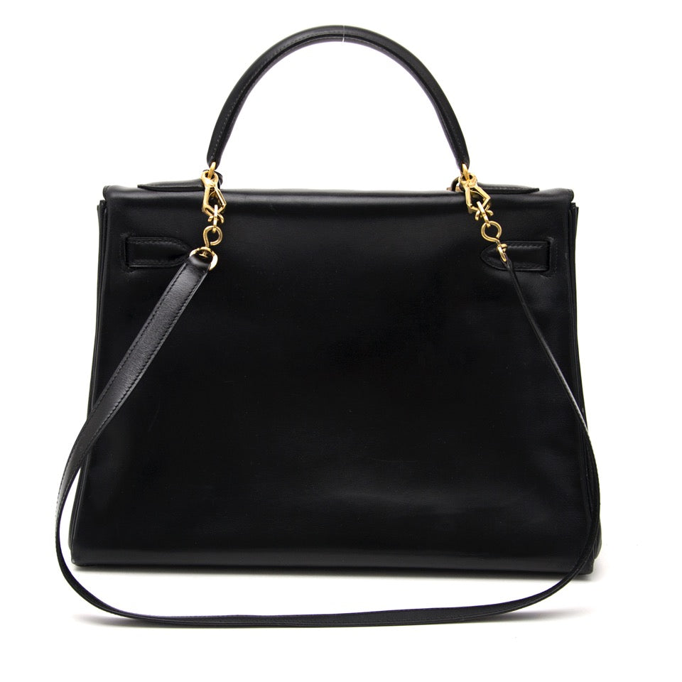 acheter en ligne pour le meilleur prix comme neuf sac a main Hermes kelly black box calf