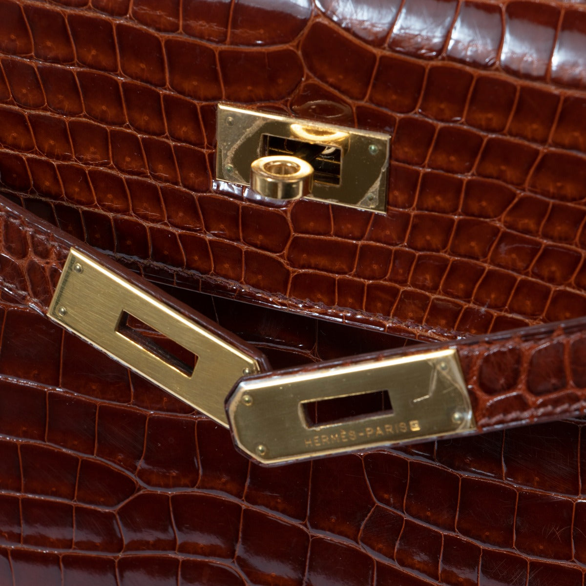 hermes kelly crocodile porosus logo plaque detail