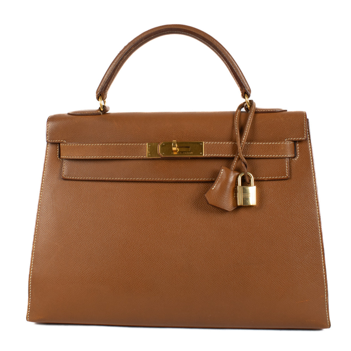 Hermès Vintage Kelly 32 Gold Courchevel GHW for the best price at Labellov secondhand luxury in Antwerp and Knokke. We buy and sell your preloved and brand new designer bags for the best price.