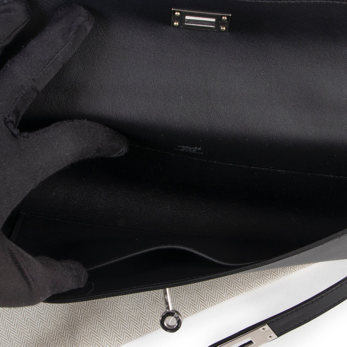 Shop safe online 100% authentic brand new Hermès Kelly Cut Pochette Black Swift PHW in brand new condition at Labellov in Antwerp.