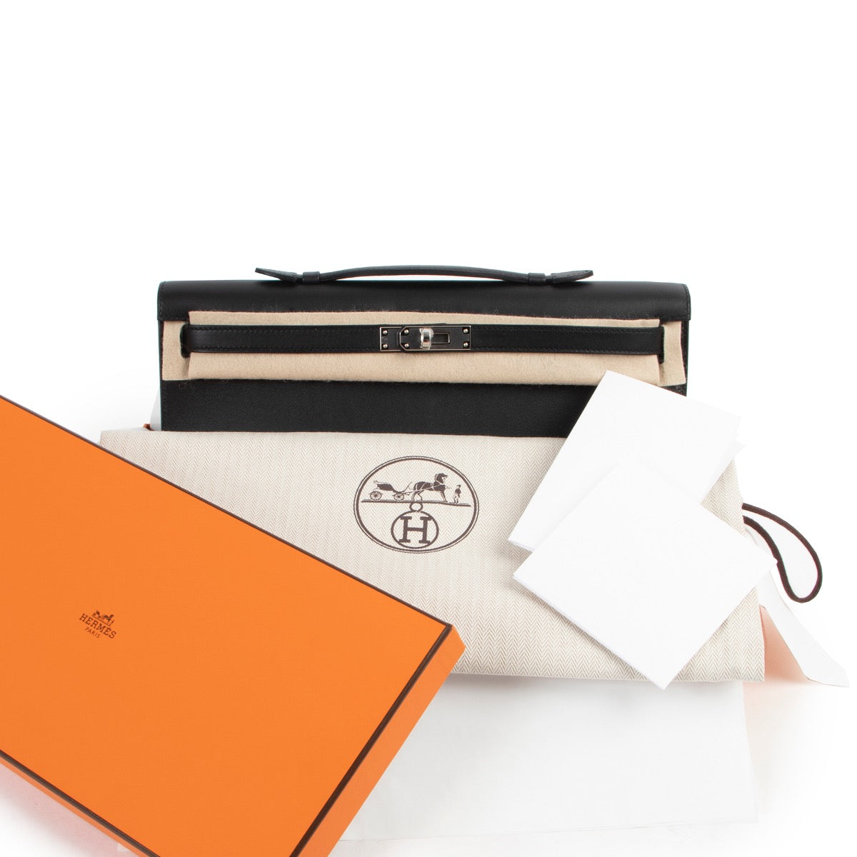 Shop safe online 100% authentic brand new Hermès Kelly Cut Pochette Black Swift PHW in brand new condition at Labellov in Antwerp.