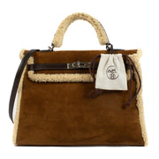 Shop authentic second hand luxury vintage designer Hermès Kelly 35 Teddy Shearling/Ebene Barenia PHW on www.labellov.com